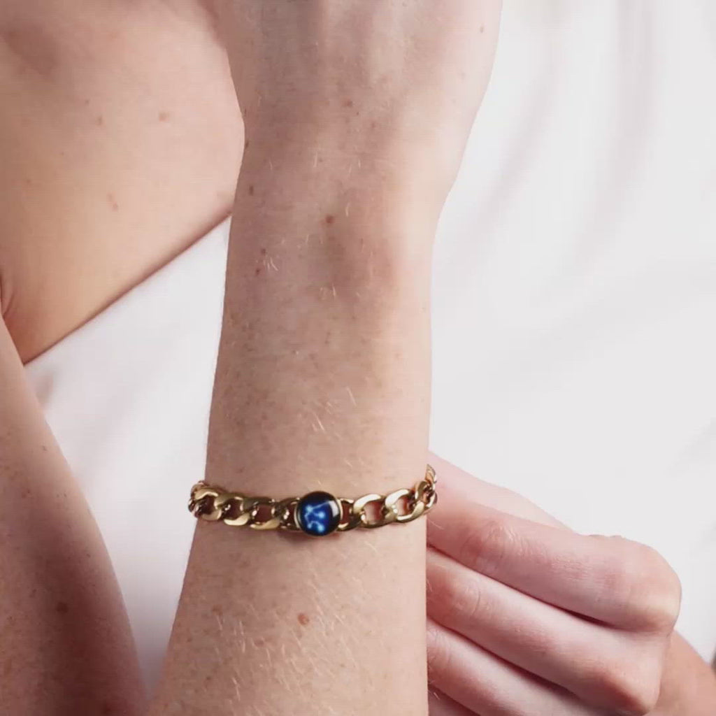 Video of woman gold plated constellation astrology link bracelet