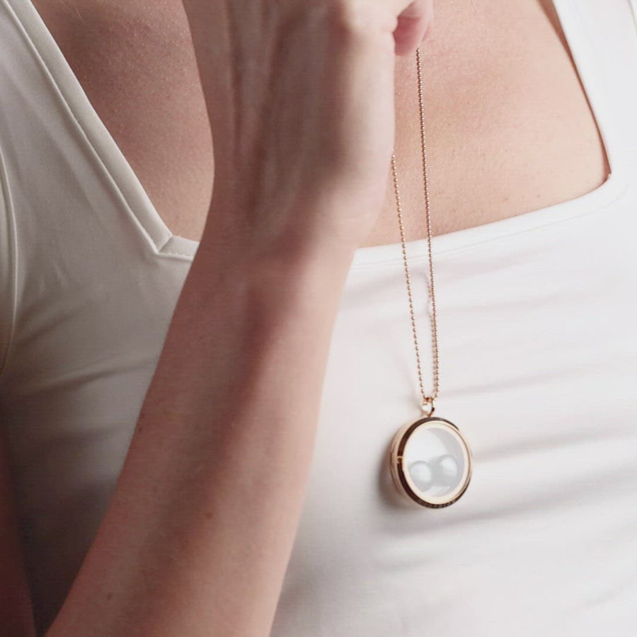 Video of woman wearing Lovers in the Locket in Gold