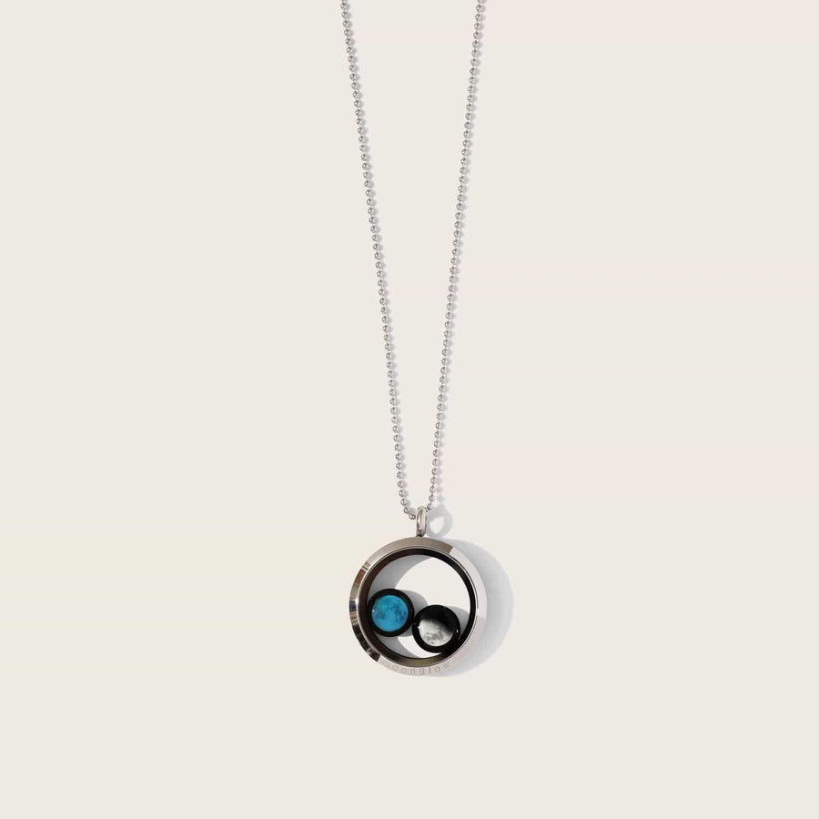 woman wearing two moon phase locket necklace in stainless steel